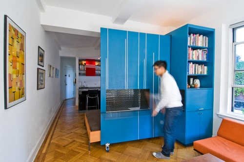 A customised storage area with a murphy bed