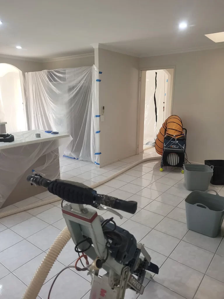 tile removal with dust reduction